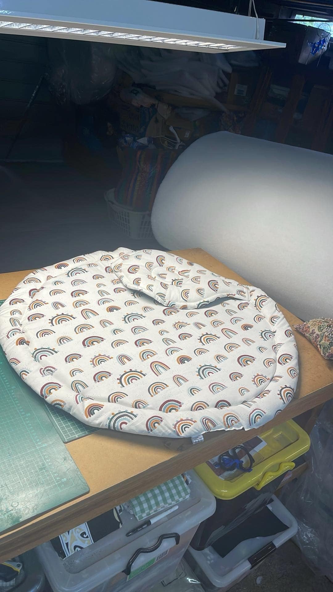 Play mat with newborn head pillow