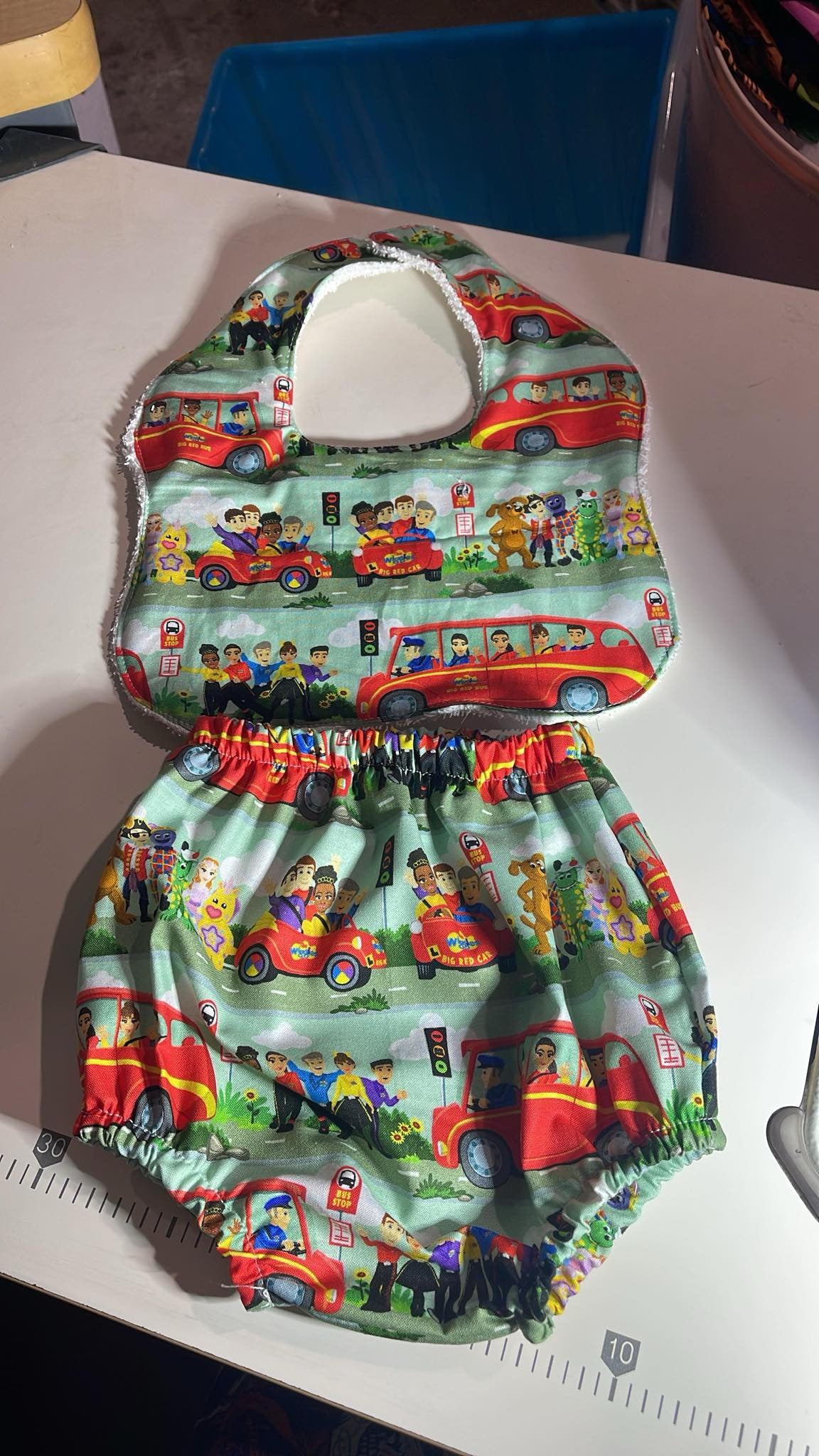 Nappy cover and bib