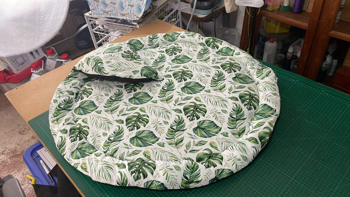Play mat with newborn head pillow