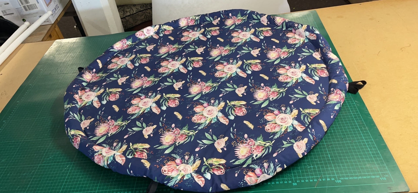 Play mat with newborn head pillow